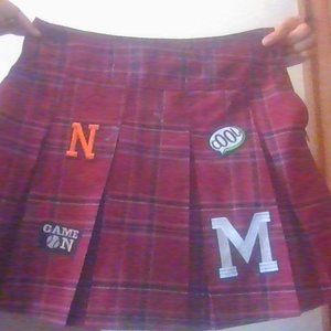 No boundaries>Brand.) A cheer designed shirt with stitched in scraps.